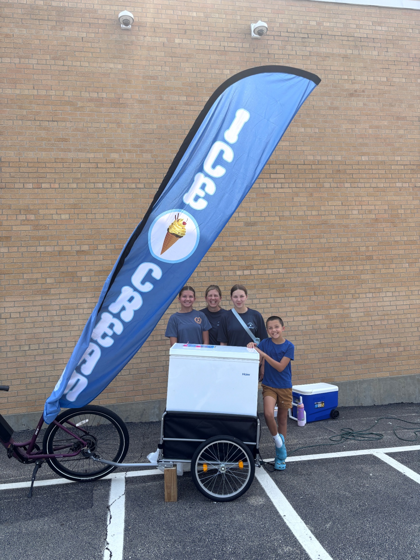 The Yeti's Frosty Treats team serving treats at an event